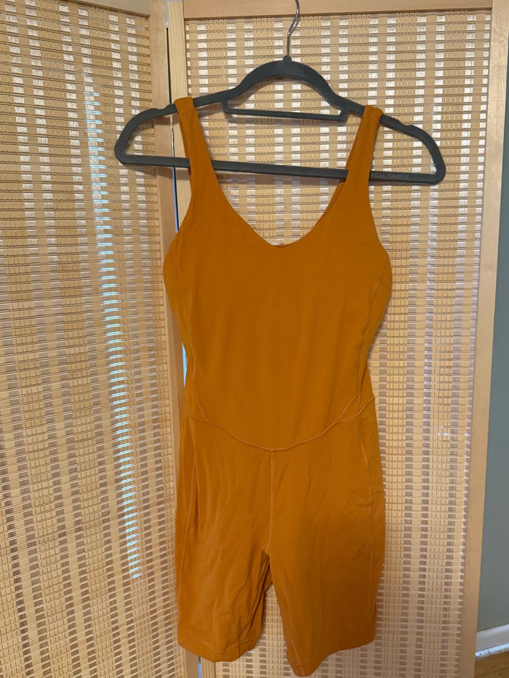 lululemon athletica women’s Sleeveless One-Piece in Mustard Yellow